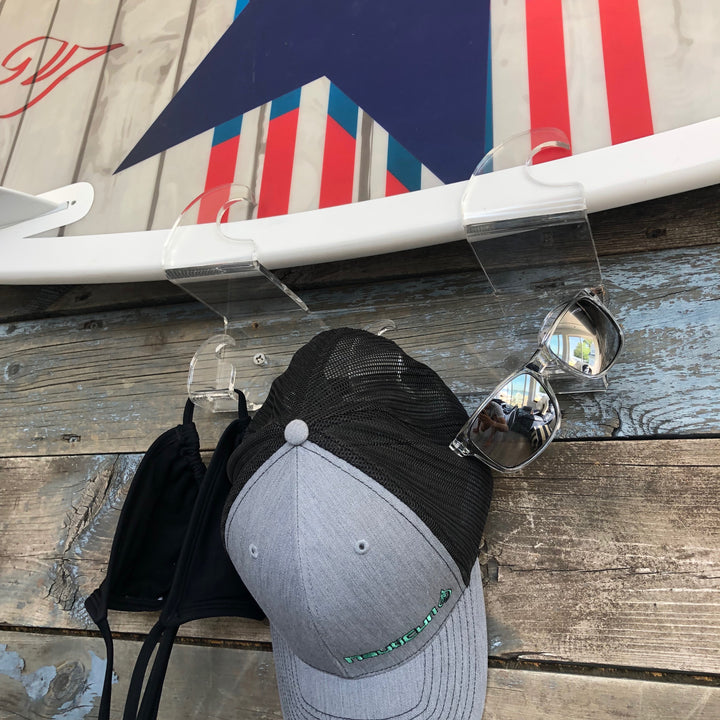 Wakesurf board rack by NautiCurl. Hang your wakeboard, wakesurfer or skateboard in style with clear acrylic racks